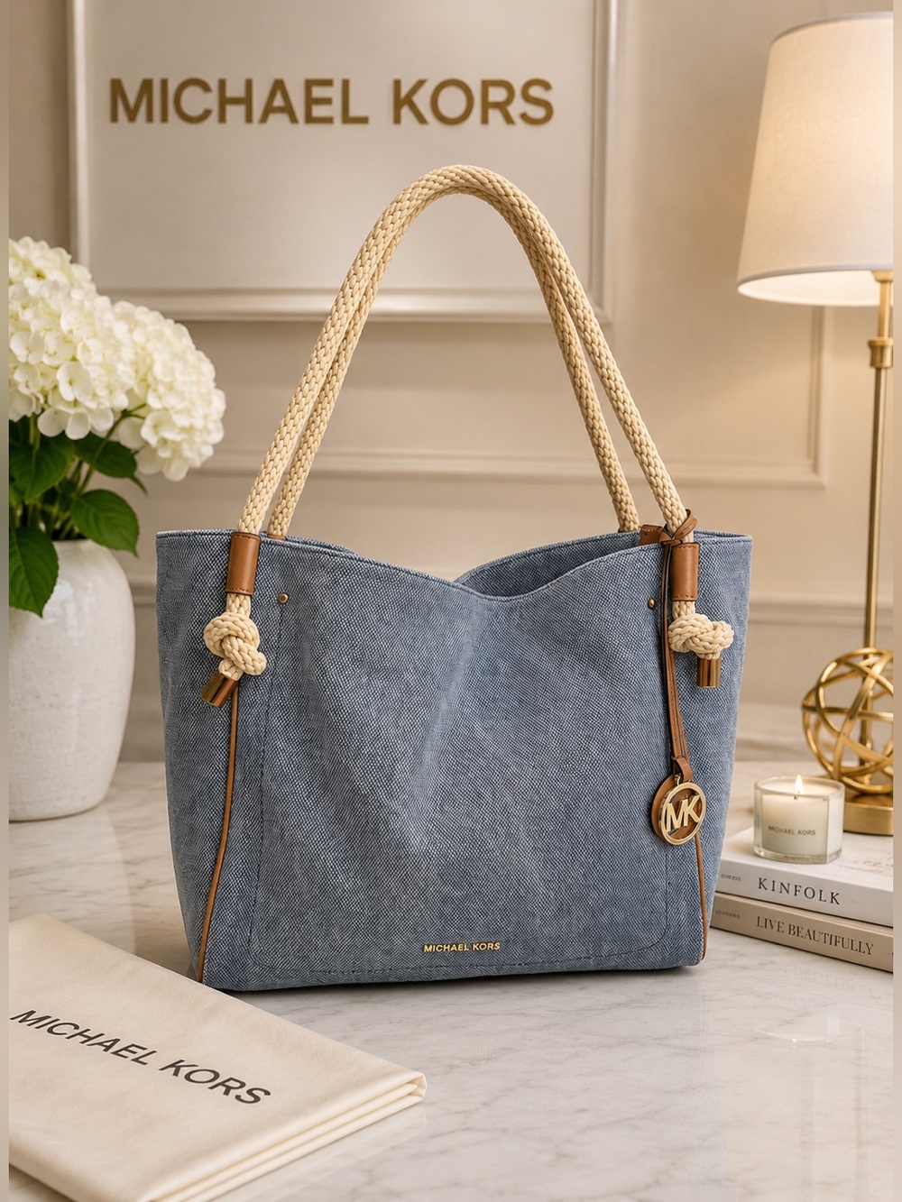 Michael Kors Isla Large Tote Bag, washed denim with signature rope handles.